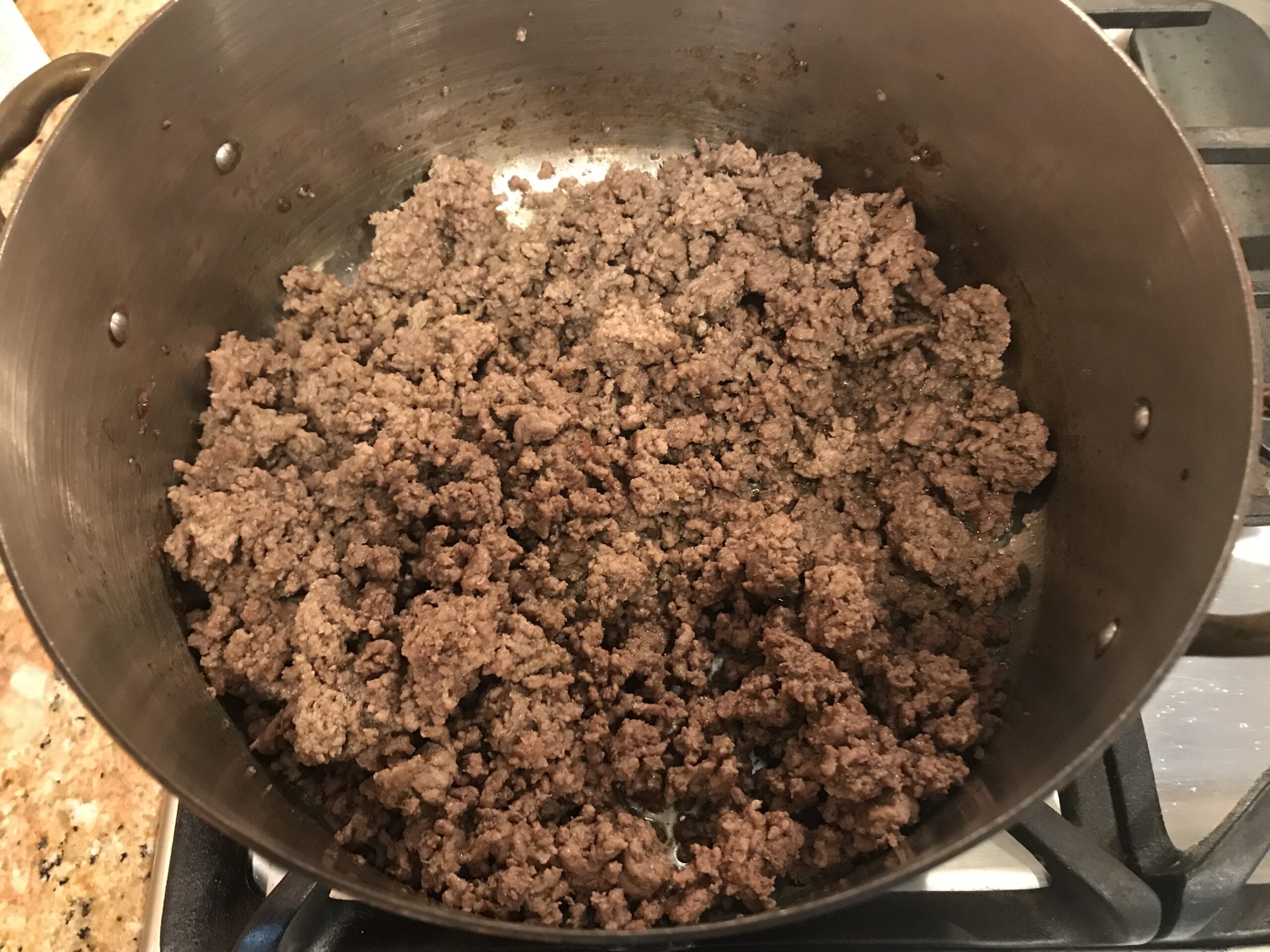 Browned ground beef in pot